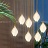 Дизайнерский подвесной светильник с каплевидным плафоном из нефритового фарфора в форме белого бутона LEA 3 плафона фото 18